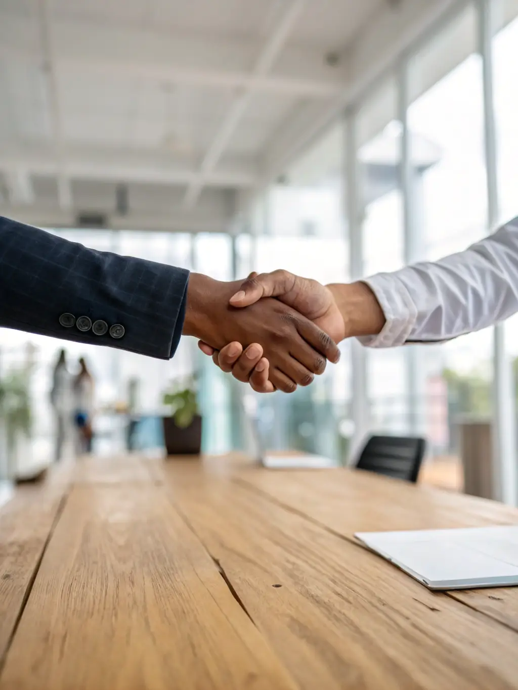 A handshake symbolizing a no-contract agreement, representing the flexibility and trust DataTel360.tech offers to its clients.
